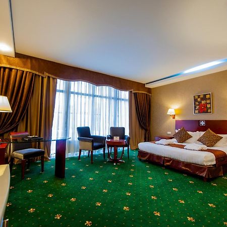 Hotel Goldman Empire Astaná Habitación foto